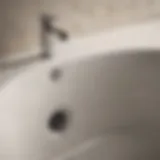 A clogged bathtub drain with visible debris