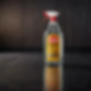 Close-up of cleaning solution on dark laminate