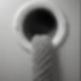 Close-up view of a dryer vent hose showing lint buildup