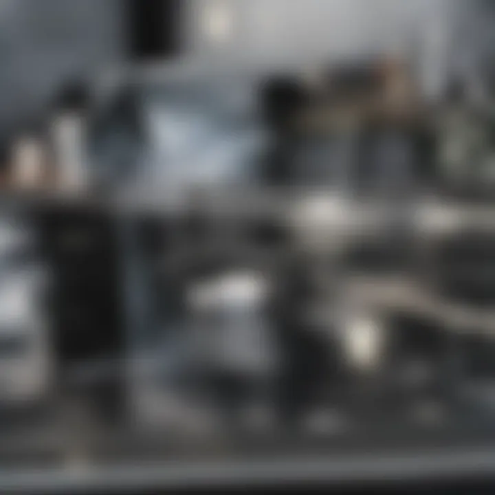 A well-maintained black glass stove top with stylish kitchen elements in the background