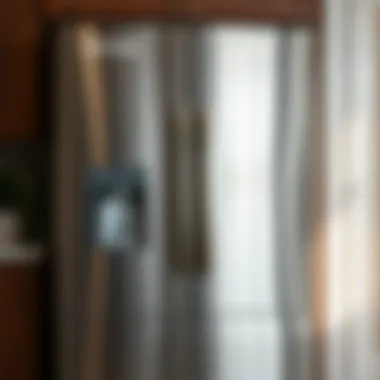 A stainless steel fridge showing before and after cleaning results.