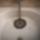 Clogged tub drain with water buildup