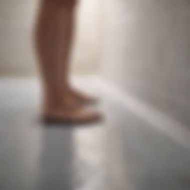 Homeowner examining a clean shower drain