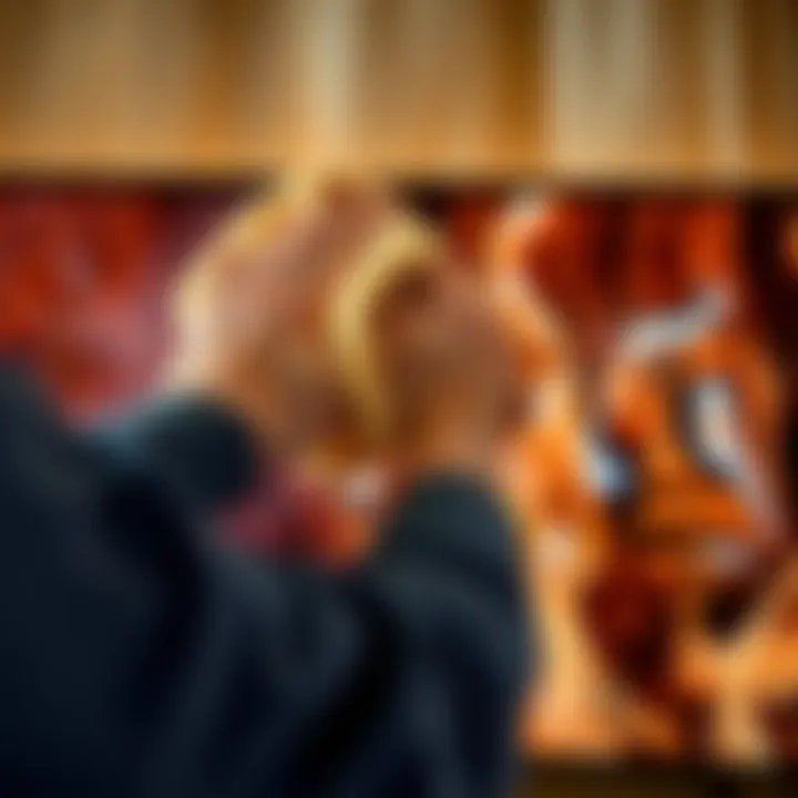 Demonstrating proper wiping technique on an HDTV