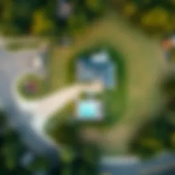 Aerial view showcasing the contrast between a large lot and a compact house.